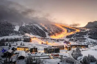 a resort in the mountains with snow on the ground at Ski-in ski-out - Hemsedal in Fjellandsbyen - view to the slopes in Hemsedal