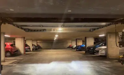 a parking garage with cars parked in it at Lægdgrinda 11 in Trondheim