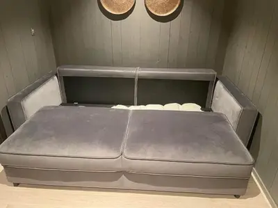 a dog bed in a corner of a room at Hovden Alpin Lodge! Ski in out in Hovden