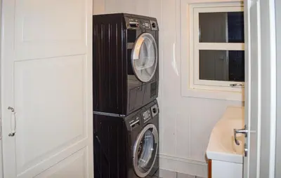 a washer and dryer in a corner of a room at Stunning Home In Trysil With Sauna in Trysil