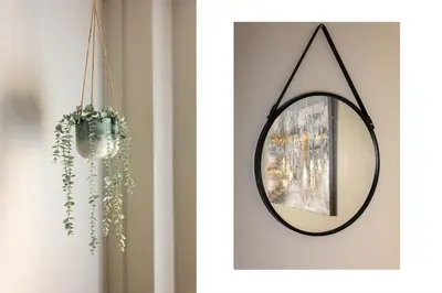 a mirror hanging on a wall in a room at Cozy studio in Bergen center in Bergen