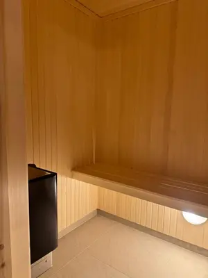 a room with a black refrigerator and a shelf at Chalet Chablis in Hemsedal