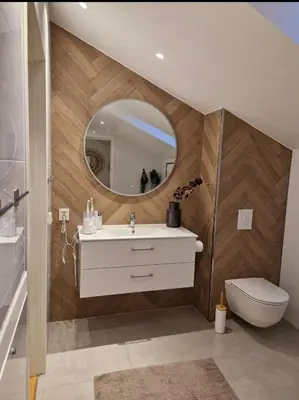 a bathroom with a sink and a mirror at Ski-VM i Trondheim 2025, house with 5 big bedrooms in Trondheim