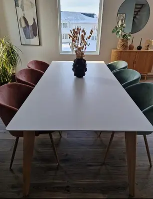 a white table in a room with chairs at Ski-VM i Trondheim 2025, house with 5 big bedrooms in Trondheim