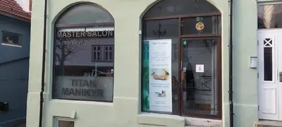 a store front with two windows with signs in it at Bergen City Center Bryggen in Bergen