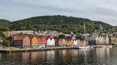 a town by the water with a bunch of houses at Bergen City Center Bryggen in Bergen