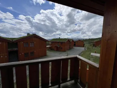 a view from the balcony of a house at 3-Story Apartment Near Slopes With Sauna And Views in Beitostøl