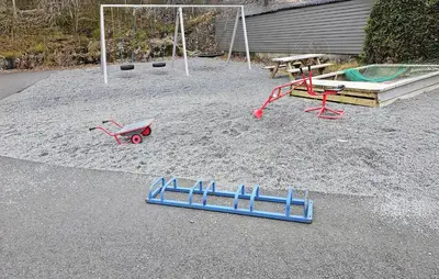 a playground with a play equipment in the sand at Gorgeous Apartment With Wifi in Godvik