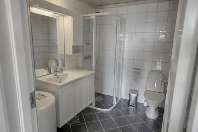 a bathroom with a toilet and a sink and a shower at Apartment By Cross-Country And Alpine Slopes in Beitostøl