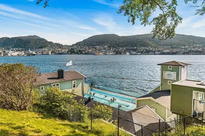 a view of a large body of water with houses at Dinbnb Apartments l Free Parking l 5 Min From Torget l Nearby Coast I Newly Furnished in Bergen