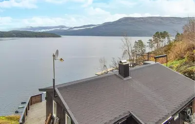 a house with a view of a lake at Amazing Home In Omastrand With Wifi in Gjuvsland