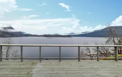 a view of a lake from a dock at Amazing Home In Omastrand With Wifi in Gjuvsland