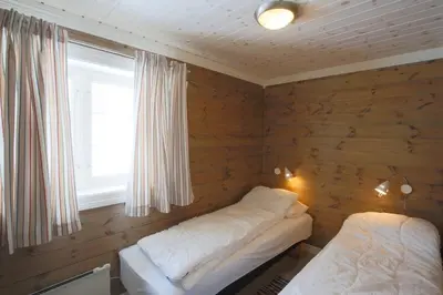 a room with a bed and a window in it at Modern Comforts, and Ski Access in Beitostøl