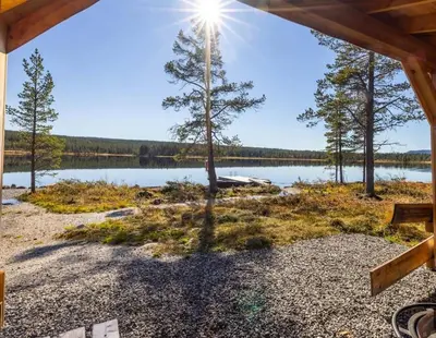 a cabin with a view of a lake at Modern cabin with a Mountain View in Nos