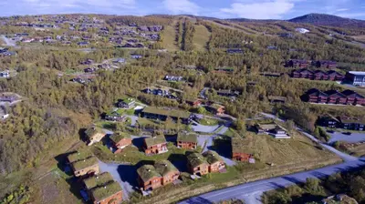 an aerial view of a village with houses and trees at Ideal Getaway For Couples Or Small Families in Beitostøl