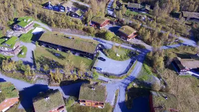 an aerial view of a house with a river at Ideal Getaway For Couples Or Small Families in Beitostøl