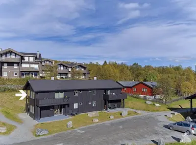 an aerial view of a black house at Modern Apartment with 3 Bedrooms and Stunning View in Beitostøl
