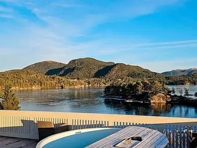 a view of a body of water with a swimming pool at 6 person holiday home in HOSTELAND in Hosteland