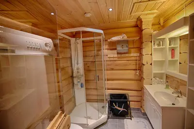 a bathroom with a shower and a toilet and a sink at Mountain Escape With Modern Amenities in Beitostøl