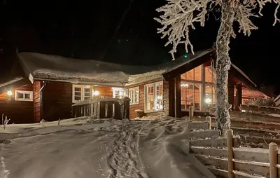 a house is covered in snow at night at 4 Bedroom Stunning Home In Hemsedal in Hemsedal