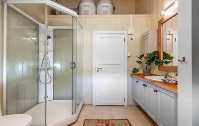 a bathroom with a shower and a toilet and a sink at 4 Bedroom Stunning Home In Hemsedal in Hemsedal