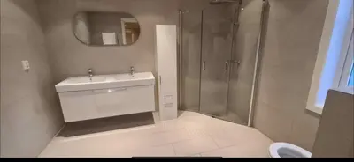 a bathroom with a sink and a shower at Odda Central Apartment in Odda