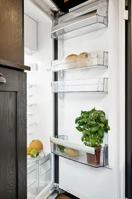 an open refrigerator filled with lots of green vegetables at Cabin With Panoramic Views Over Trysil in Trysil
