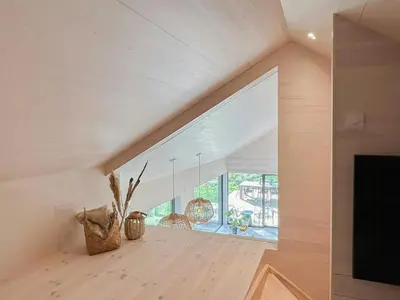 a room with a large window in a house at New Cabin By Tyrifjorden For Relaxing Holidays in Gjesval