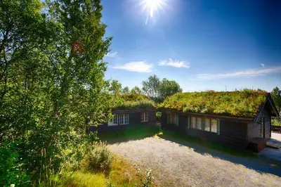 an overhead view of a house with a grass roof at A Cozy, Rustic Retreat With Fireplace And Terrace in Beitostøl