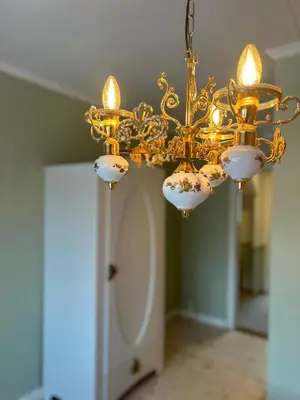 a chandelier hanging from a ceiling in a room at Sognefjord Gjesteheim in Vangsnes