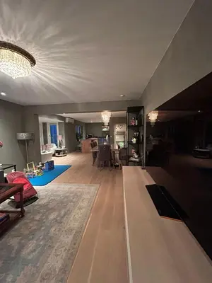 a living room with a couch and a living room with a table at Singsaker Panorama in Trondheim