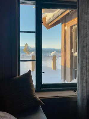 a window with a view of a snow covered yard at Modern Cabin With Beautiful Design By Gålåvatn in Gålå