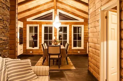 a dining room with a table and chairs at Cozy Cabin In Uvdal With Jacuzzi And Sauna in Uvdal