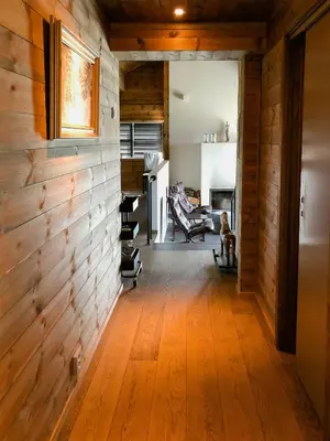 a hallway with wood paneled walls and a room at Cozy Holiday Home Embraced By Valdres Hills in Vang I Valdres