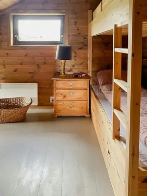 a bedroom with a bunk bed and a window at Cozy Holiday Home Embraced By Valdres Hills in Vang I Valdres
