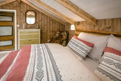 a bedroom with a bed in a room at Family-Friendly Cabin With Agricultural Idyll in Vestre Gausdal