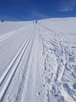 a trail in the snow with people skiing on it at Mountain Home At Haglebu With Activities in Eggedal