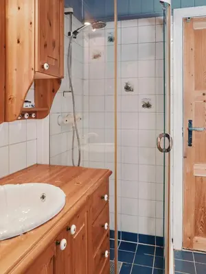 a bathroom with a sink and a shower at Cabin In Uvdal With A View Ski-Inout in Uvdal