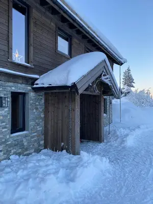 a building with snow on top of it at Modern Luxury And Homely Vibe In Flå in Flå