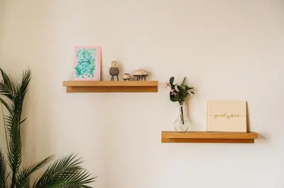 a wall with two wooden shelves on a wall at Unique apartment-Romantic Street-Easy Check-In in Bergen