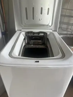 a washer with its door open in a appliance at Turifoss Camping Cabin 2 in Svedjan