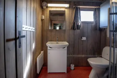 a bathroom with a sink and a toilet at Trysilfjellet Sør 17 in Trysil