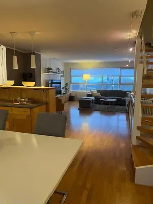 a living room with a couch and a table at House with 5 bedrooms very close to World Cup 25 in Granåsen in Trondheim