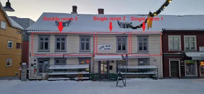 a building with a sign on top of it at Storgata 36B in Lillehammer