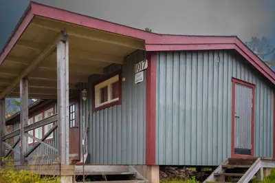 a large metal building with a red roof at Trysilfjellet Nord 1017 in Trysil
