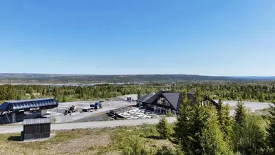 an aerial view of a building in the woods at Stor leilighet på Bualie, Golsfjellet in Gol