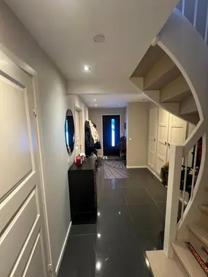 a room with a hallway with a room with a door at Villa til leie under SKI-VM in Trondheim