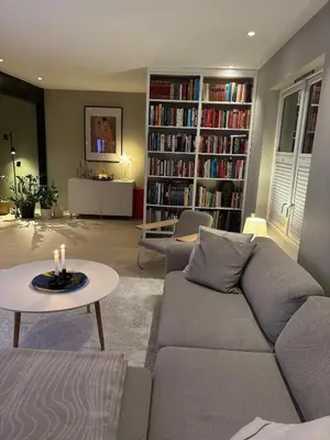 a living room with a couch and a table with candles at Beautiful house - walking distance of everything in Trondheim