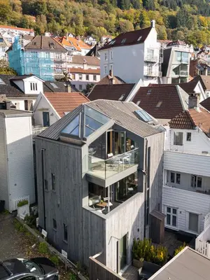 an aerial view of a house with glass at Bryggen Penthouse I NEW 2021 in Bergen