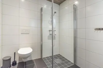 a bathroom with a shower and a toilet at Trysiltunet 6A in Trysil
